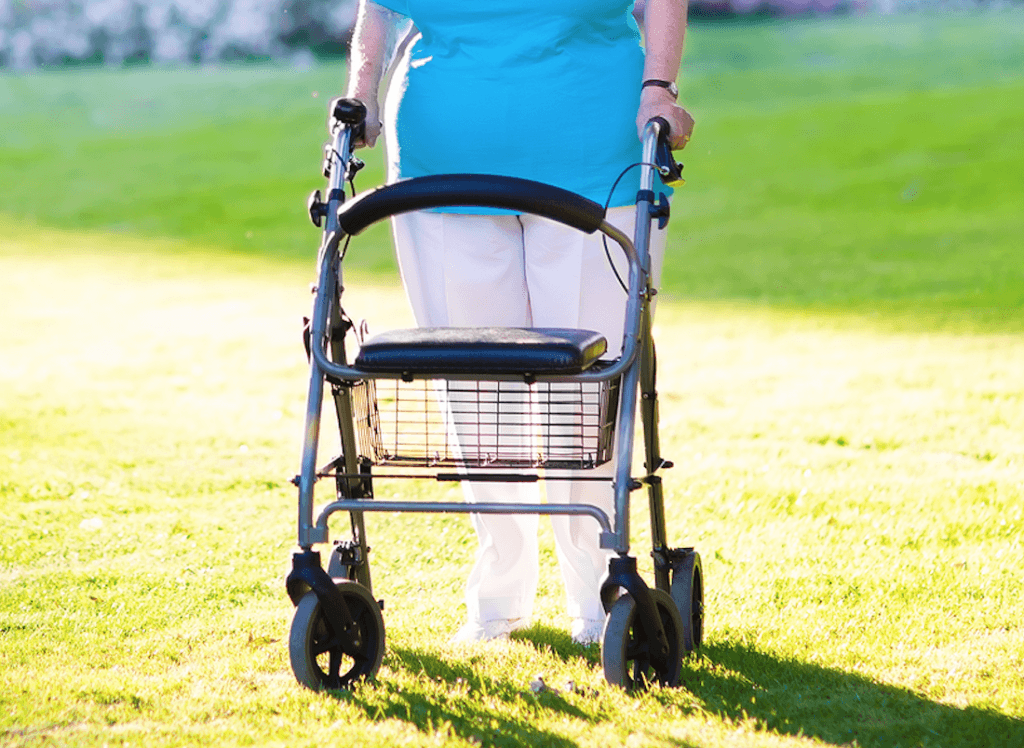 senior walking with rollator