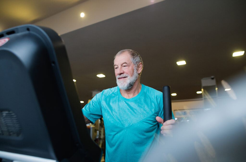 senior using elliptical