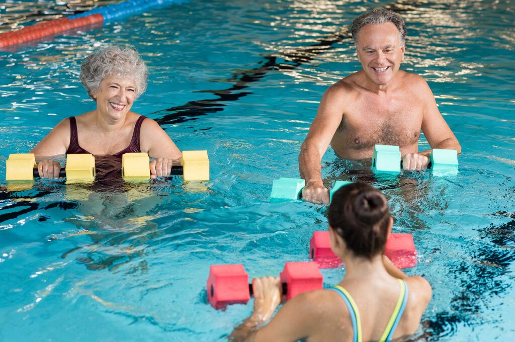 seniors exercising in pool