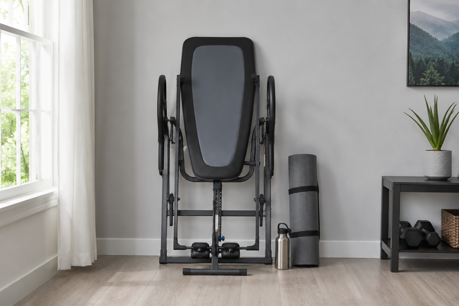 inversion table lying folded against the wall